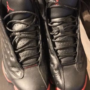 Black and red Jordan 13's